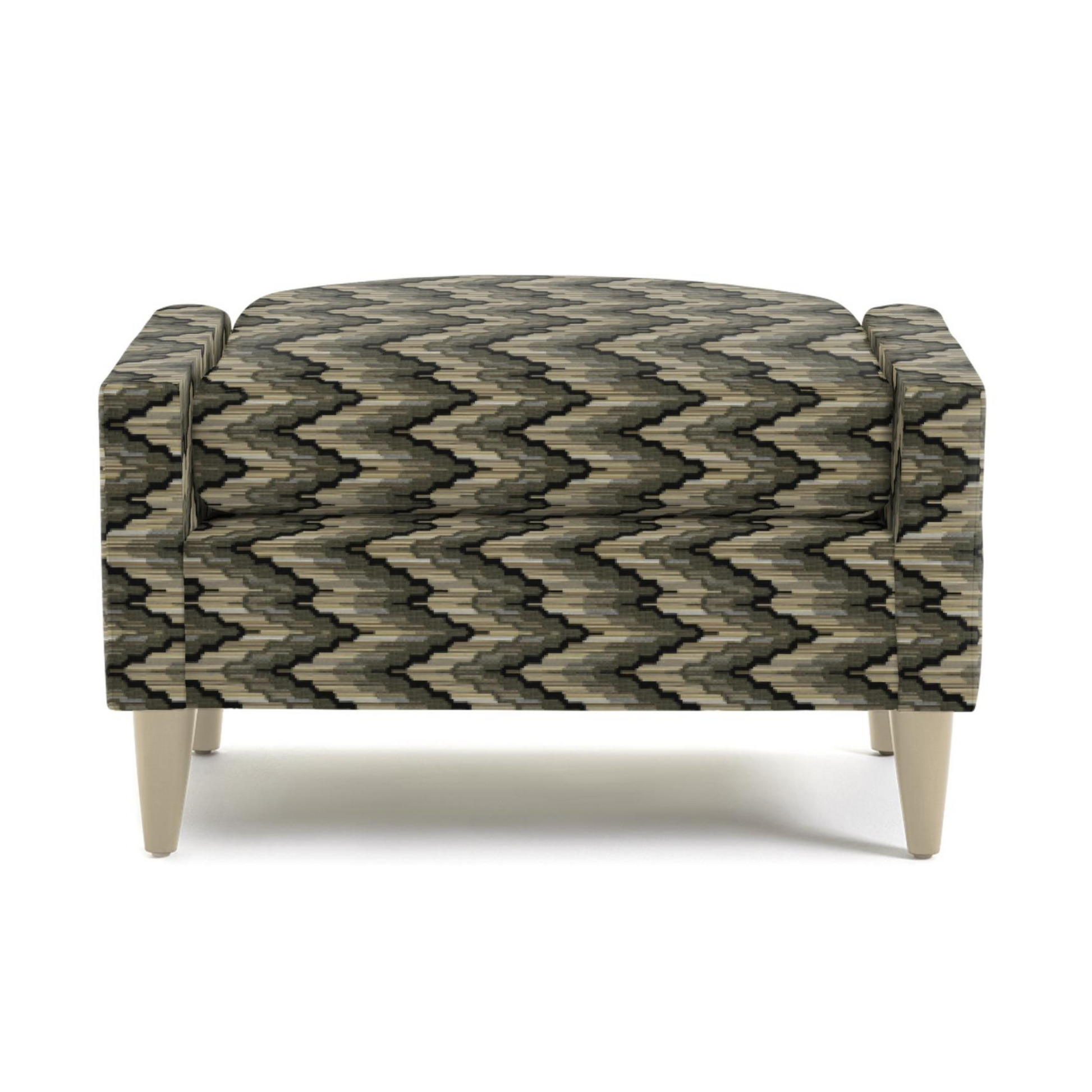 Modern accent chair with black, gray, and beige zigzag patterned upholstery and light wooden legs — contemporary living room furniture piece.
