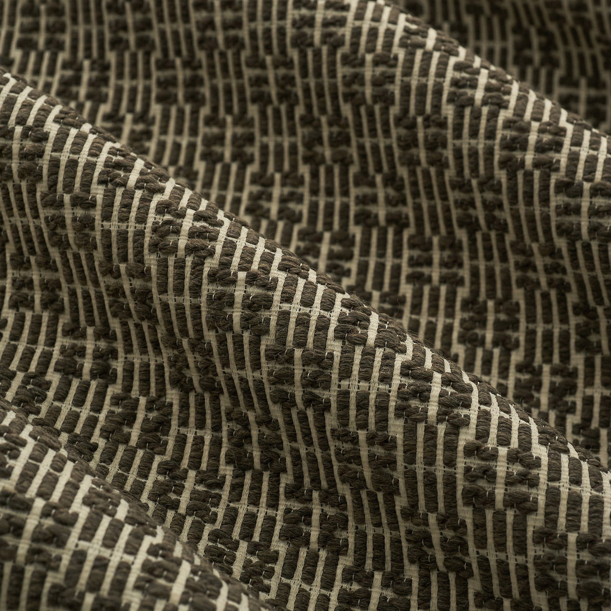 Goodbar Ottoman in Rossner Brown - Fineza